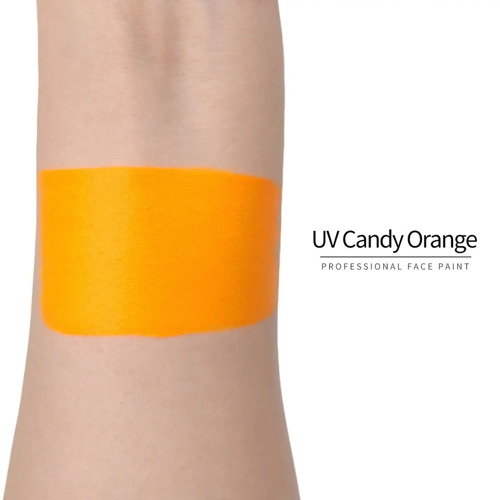 Anka Bella UV Candy Orange face paint arm swatch, bright neon candy orange UV glow body paint sample on skin