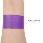 Matte lavender face paint swatch on arm, high pigment water based body art makeup