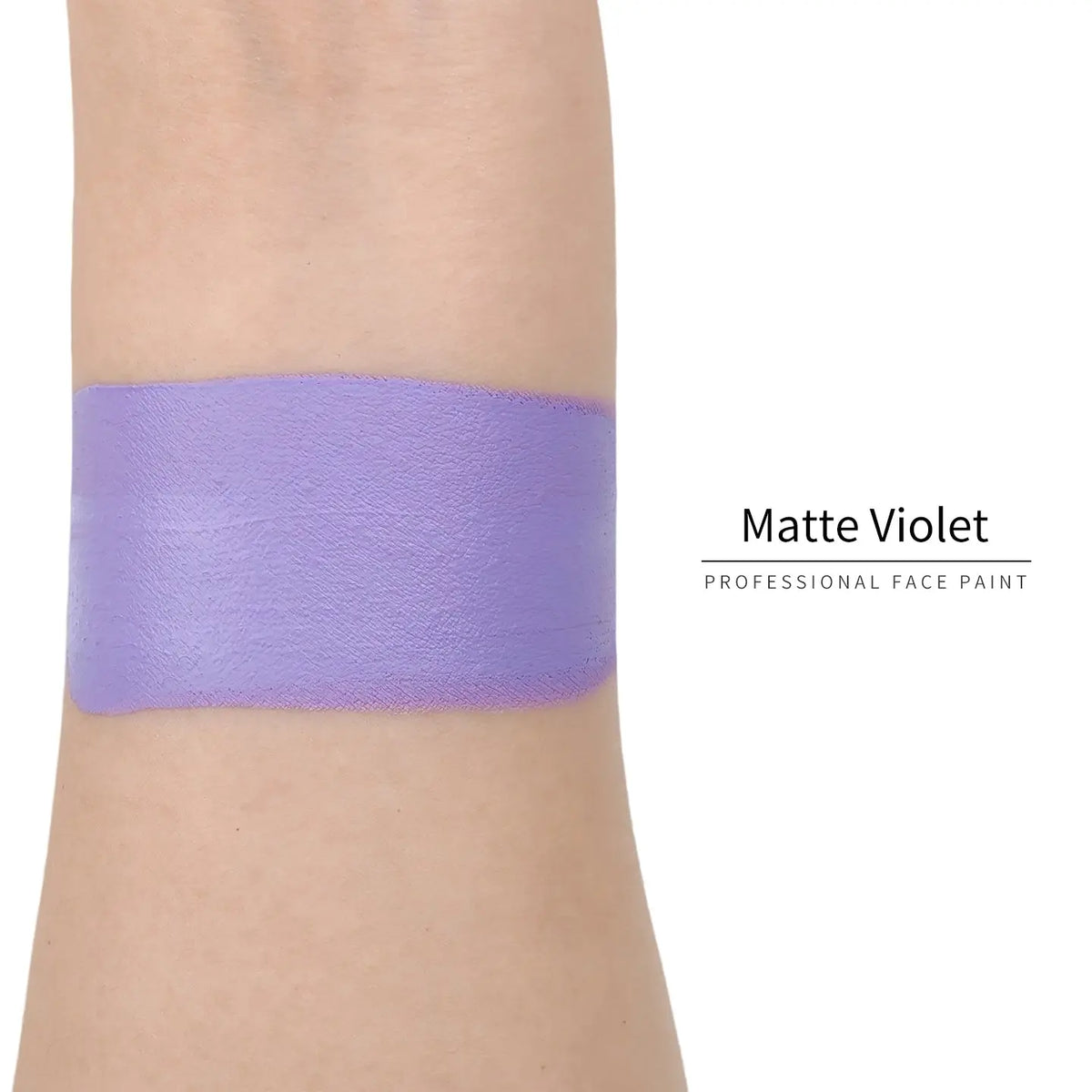 Matte violet face paint swatch on arm, high pigment water based body art makeup