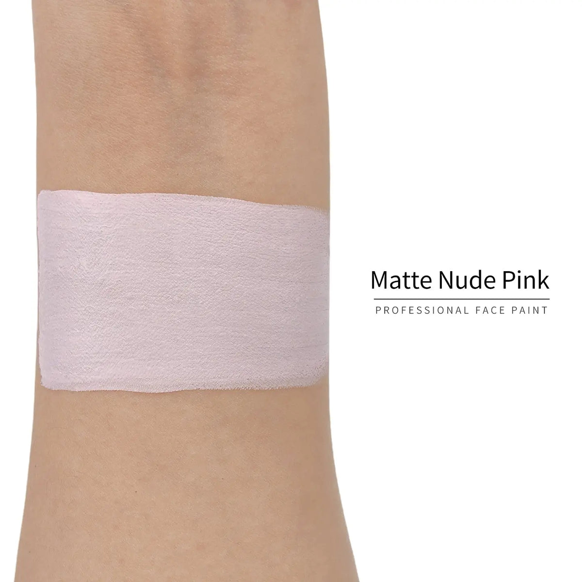 Matte nude pink face paint swatch on arm, high pigment water based body art makeup