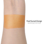 Anka Bella Pearl Sunset‑Orange face paint arm swatch, warm shimmer sunset‑orange pearl body paint sample on skin