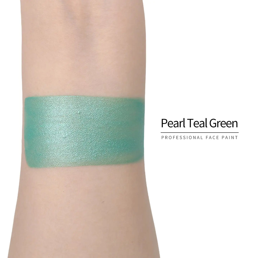 Anka Bella Pearl Teal‑Green face paint arm swatch, cool shimmer teal‑green pearl body paint sample on skin