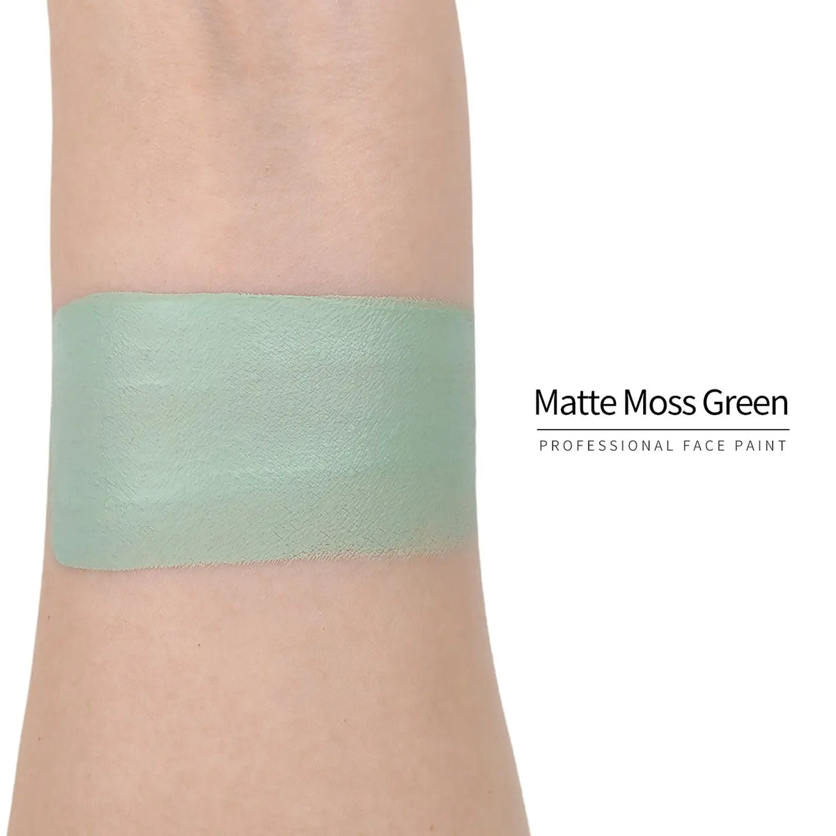 Matte moss green face paint swatch on arm, high pigment water based body art makeup
