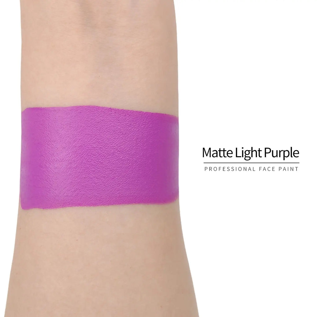 Matte light purple face paint swatch on arm, high pigment water based body art makeup