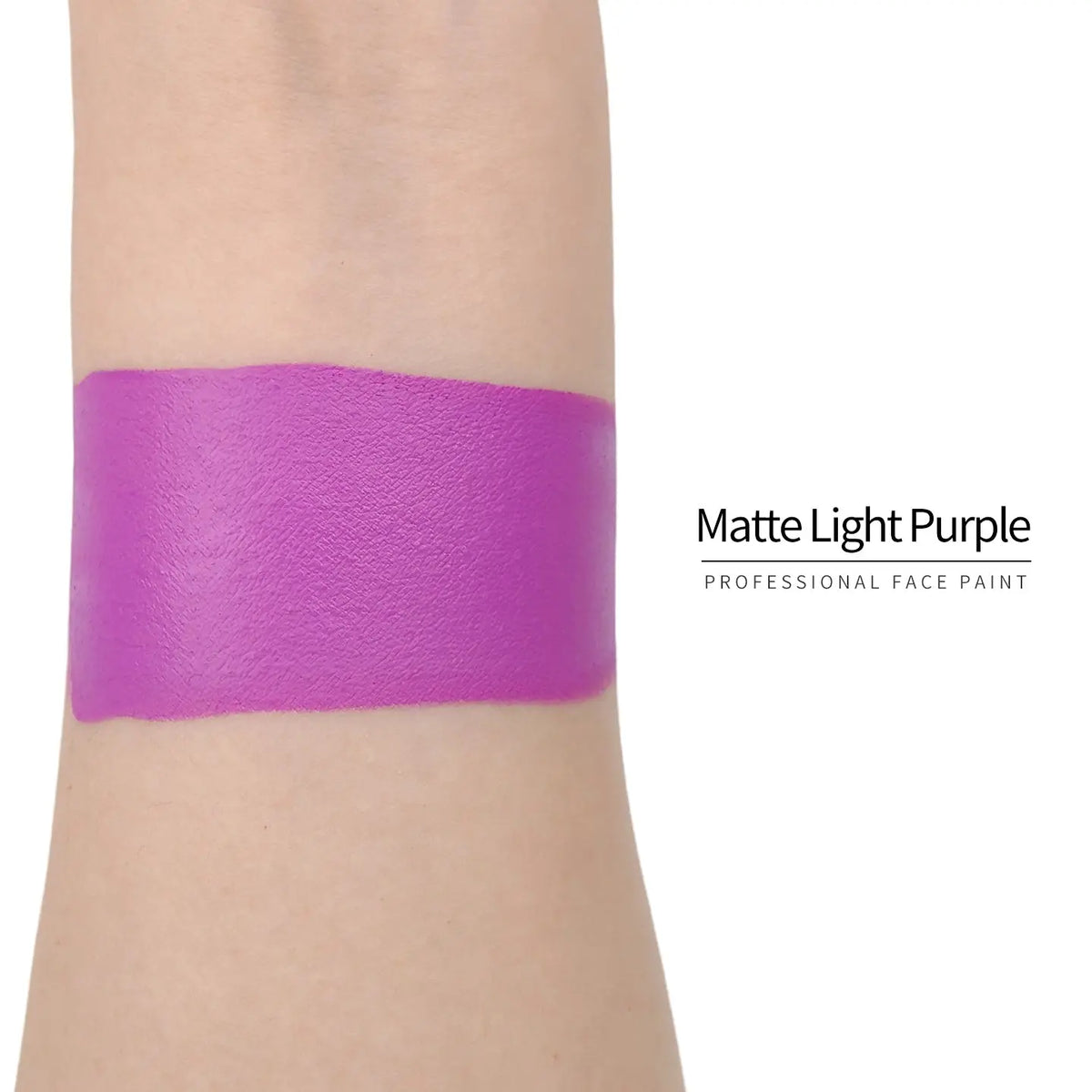 Matte light purple face paint swatch on arm, high pigment water based body art makeup