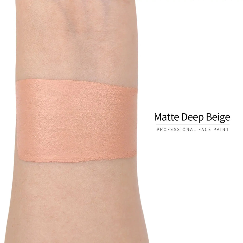 Matte deep beige face paint swatch on arm, high pigment water based body art makeup