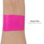 Matte pink face paint swatch on arm, high pigment water based body art makeup