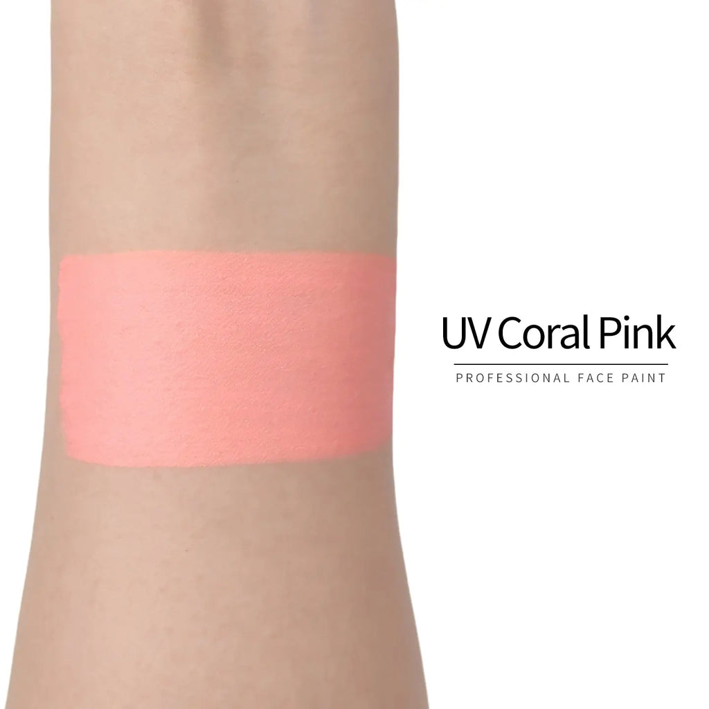 Anka Bella UV Coral‑Pink face paint arm swatch, warm neon coral‑pink UV glow body paint sample