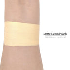Matte cream peach face paint swatch on arm, high pigment water based body art makeup
