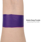 Matte deep purple face paint swatch on arm, high pigment water based body art makeup