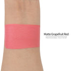 Matte grapefruit red face paint swatch on arm, high pigment water based body art makeup