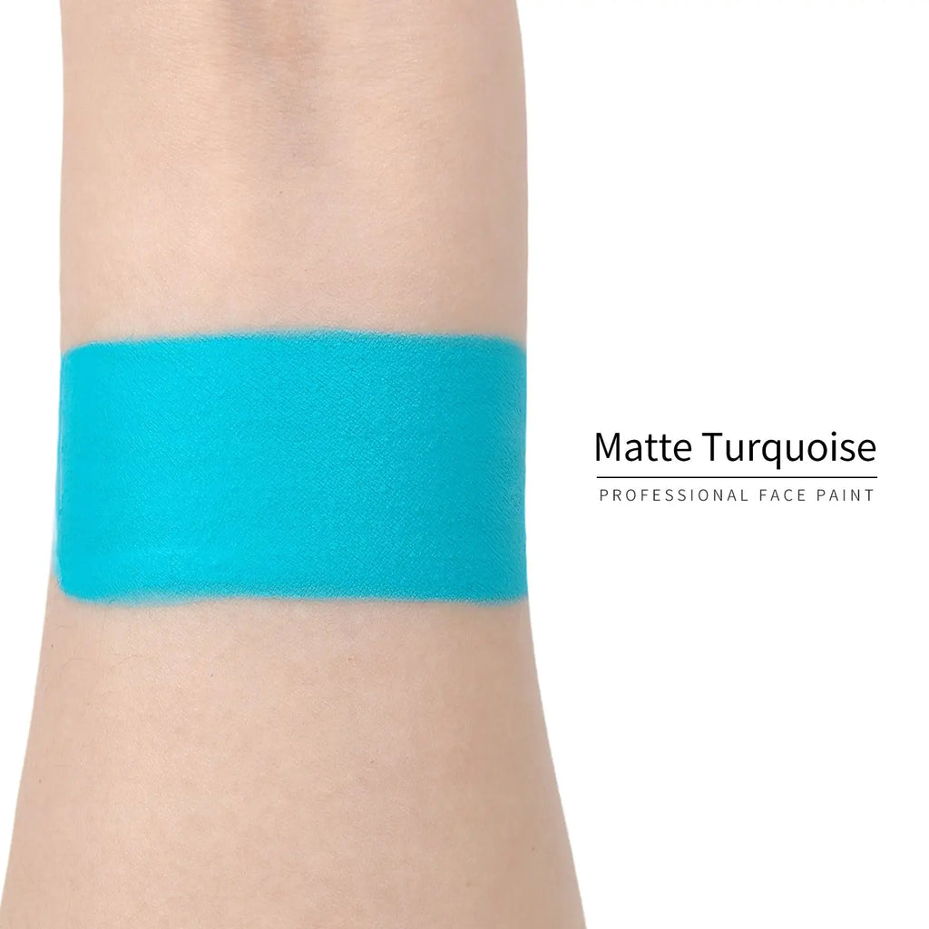 Anka Bella Matte Turquoise face paint arm swatch, vivid tropical turquoise matte body paint sample on skin