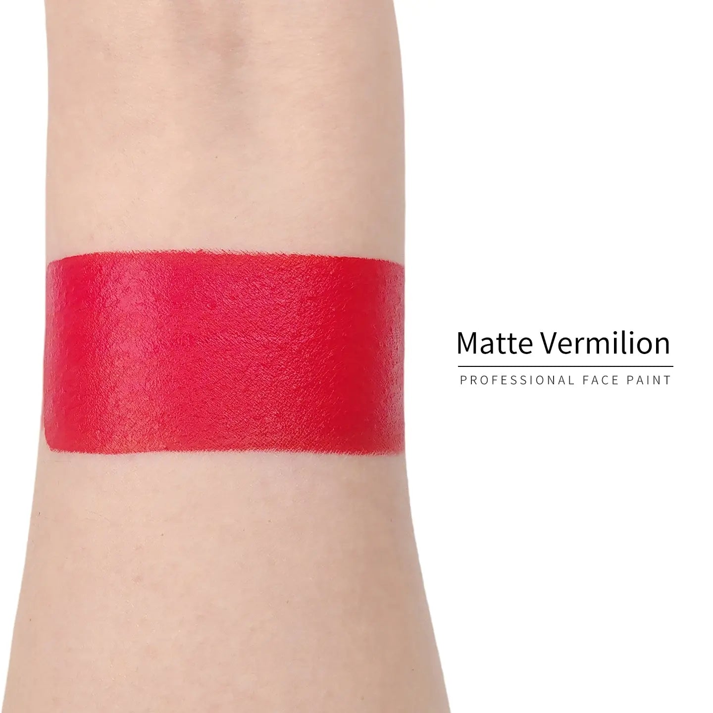 Anka Bella Matte Vermilion face paint arm swatch, rich vermilion red matte body paint sample on skin
