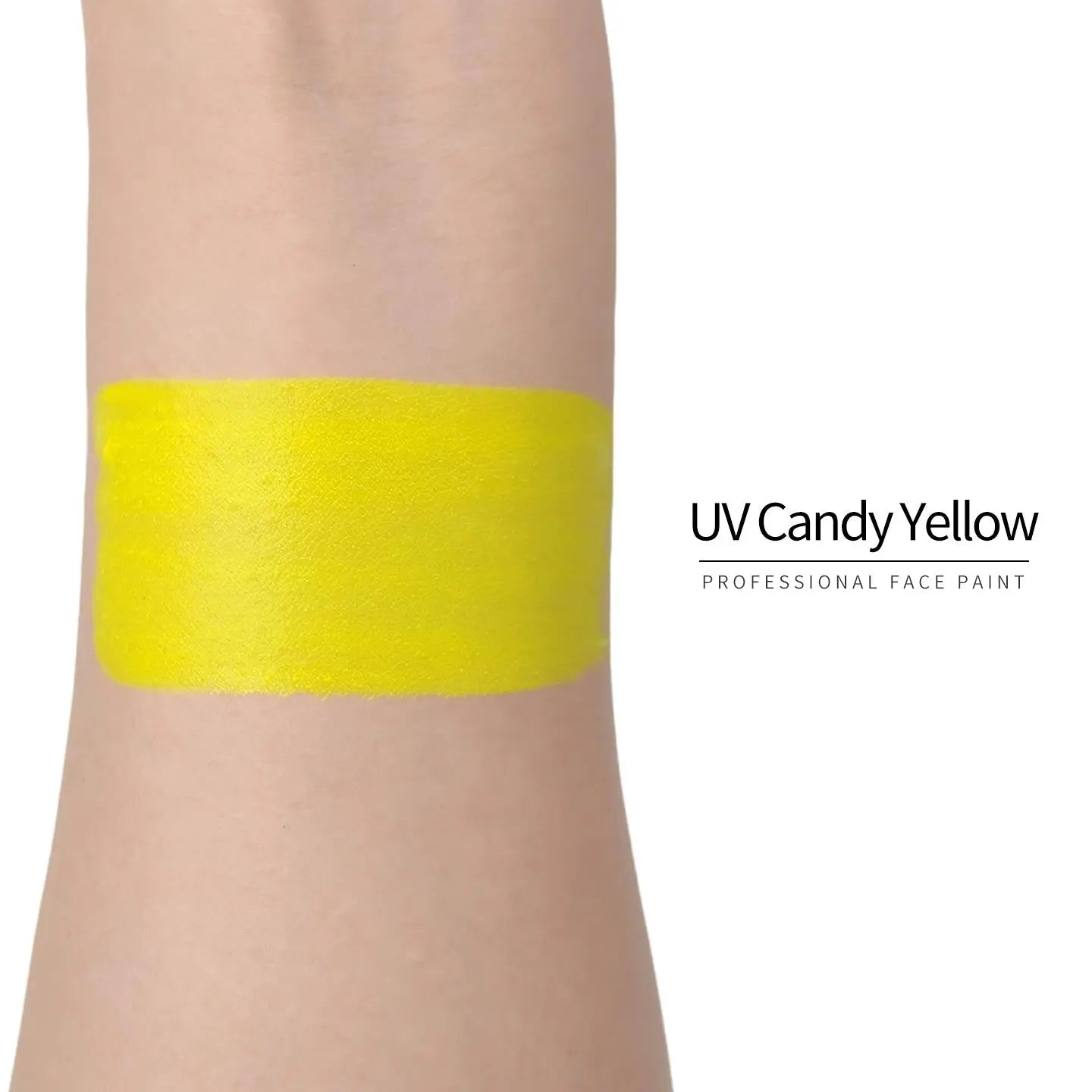Anka Bella UV Candy Yellow face paint arm swatch, bright neon yellow UV glow body paint sample on skin