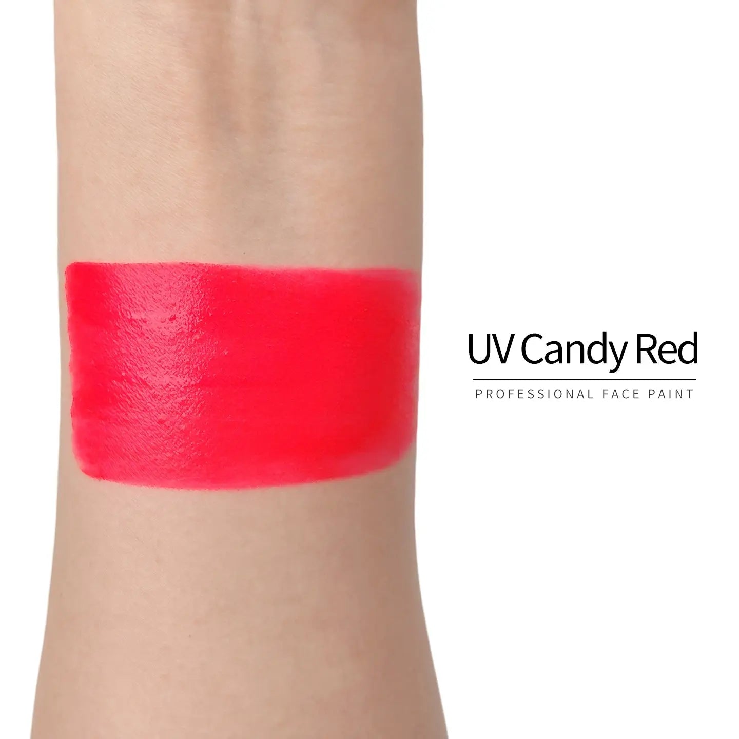 Anka Bella UV Candy Red face paint arm swatch, bright neon red UV glow body paint sample