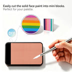 Cut Anka Bella solid matte apricot pink face paint into mini blocks to build custom DIY split‑cake face paint palette