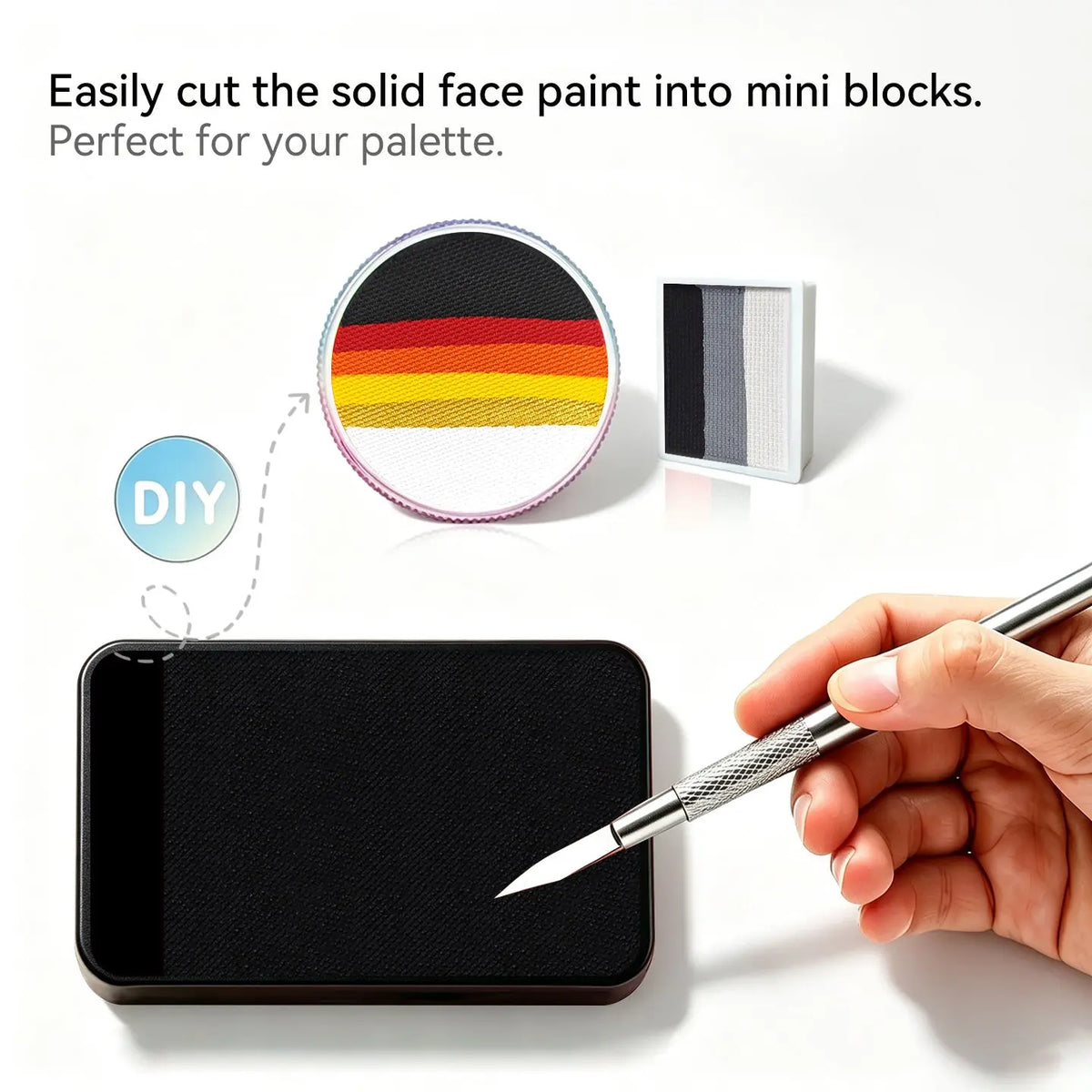 Cut Anka Bella solid matte black face paint into mini blocks to build custom DIY split‑cake face paint palette