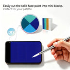 Cut Anka Bella solid matte blue face paint into mini blocks to build custom DIY split‑cake face paint palette