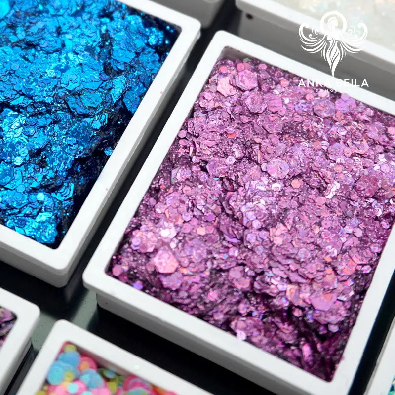 Anka Bella oil based chunky glitter close up, purple and blue cosmetic glitter for face body makeup